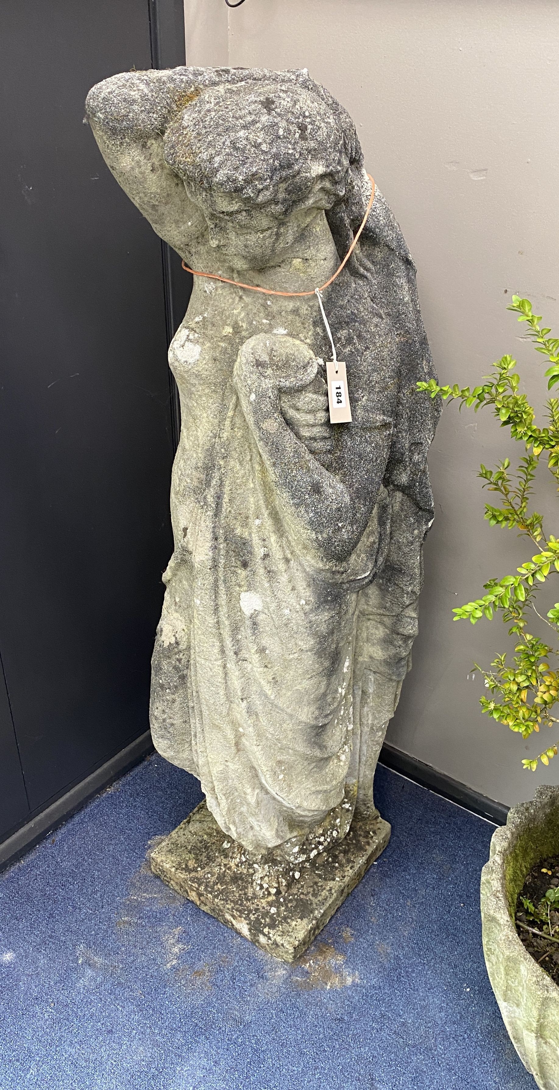 A reconstituted stone figure of Venus, on square plinth, height 130cm